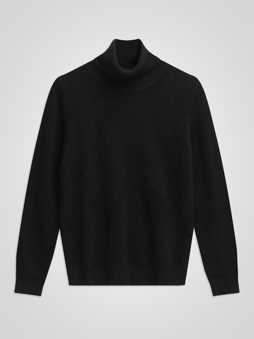 Høyhalset kashmirgenser i fargen sort. 100% ren kasjmirull. Norsk design fra KASHMINA.