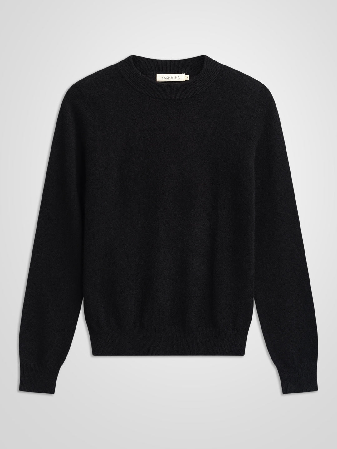 Kashmirgenseren "Thora" med lange ermer og rund hals i 100% ren kasjmirull. Norsk design fra Kashmina. Farge: Sort.